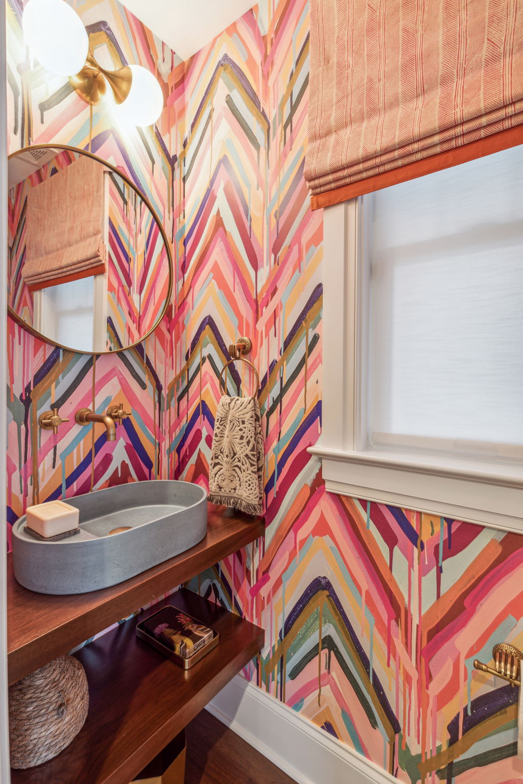 powder room with colorful wallpaper